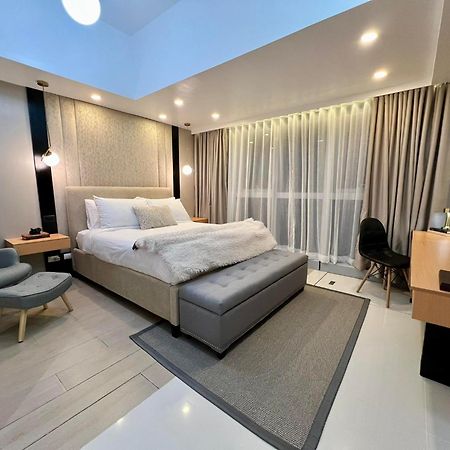 Hotel Vibe Condo At Uptown Parksuites Bgc Taguig Exterior foto